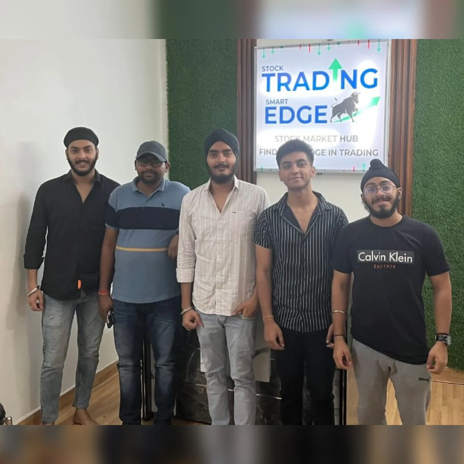 Group of students with stock market certificates