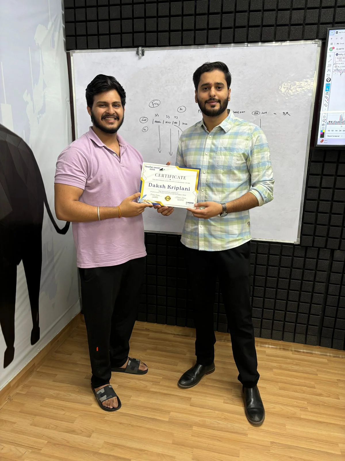 Student receiving certificate at Trading Smart Edge 1